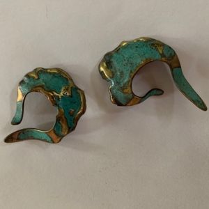 Funky brass ear cuffs